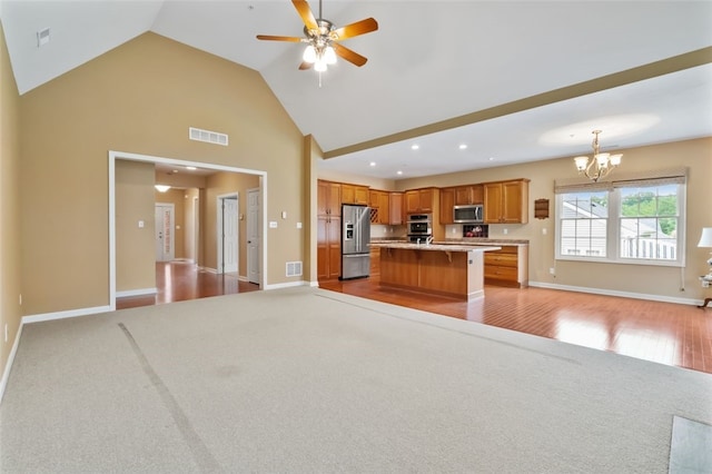 121 Anglers Way, Peters Twp, PA 15317 - kitchen featuring stainless steel appliances, open floor plan, light carpet, a chandelier, and light countertops