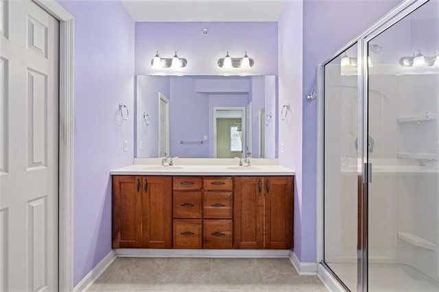121 Anglers Way, Peters Twp, PA 15317 - bathroom featuring a stall shower, double vanity, and tile patterned flooring