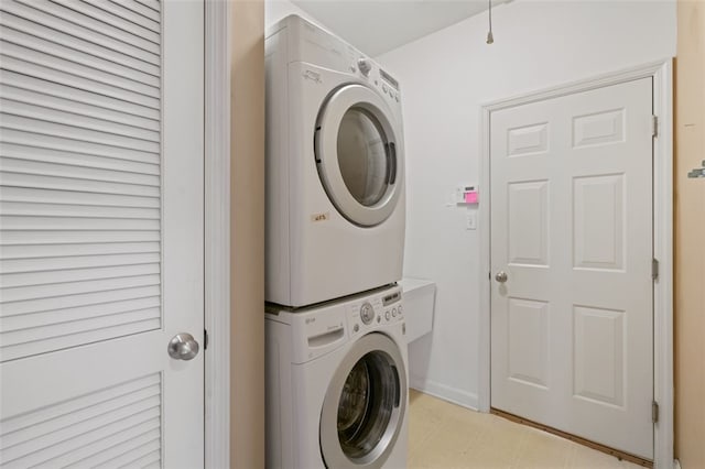 121 Anglers Way, Peters Twp, PA 15317 - laundry area featuring estacked washer and dryer and baseboards