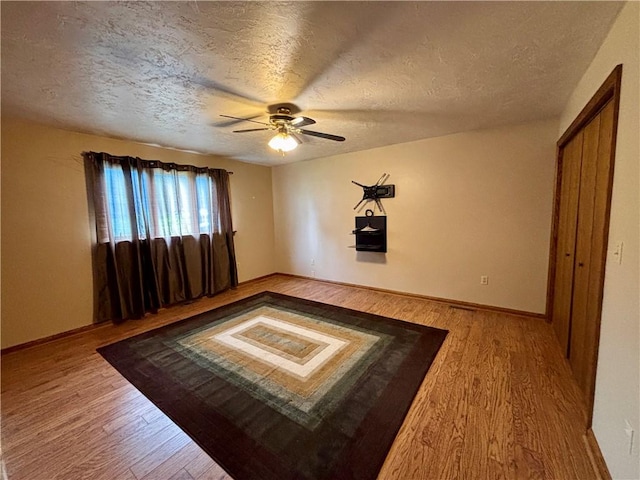 2105 Pulaski Rd, Neshannock Twp, PA 16105 - unfurnished room featuring light wood-type flooring, ceiling fan, and a textured ceiling