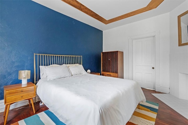 1037 Chislett St, Morningside, PA 15206 - bedroom with wood finished floors and a tray ceiling