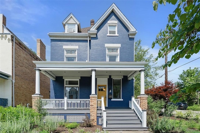 1037 Chislett St, Morningside, PA 15206 - view of front of home with a porch and brick siding