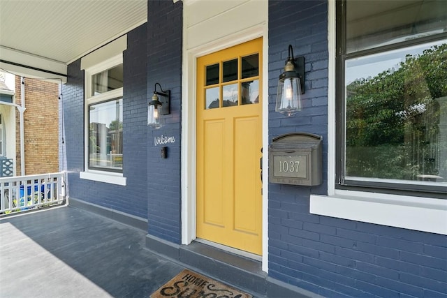 1037 Chislett St, Morningside, PA 15206 - property entrance featuring a porch and brick siding