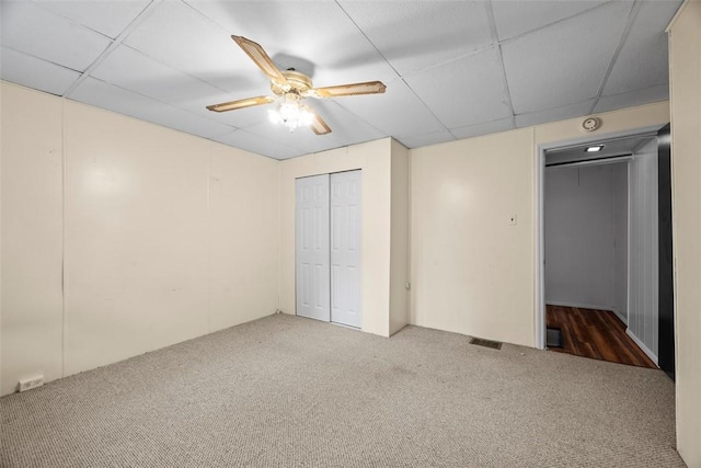 4829 Hatfield St, Lawrenceville, PA 15201 - unfurnished bedroom featuring carpet flooring, ceiling fan, a drop ceiling, and a closet