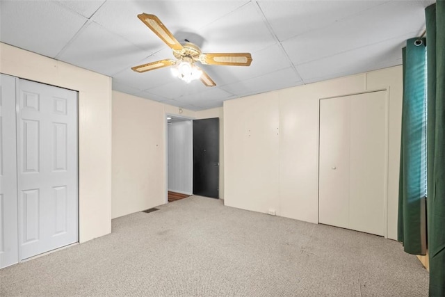 4829 Hatfield St, Lawrenceville, PA 15201 - unfurnished bedroom featuring carpet, a drop ceiling, and ceiling fan