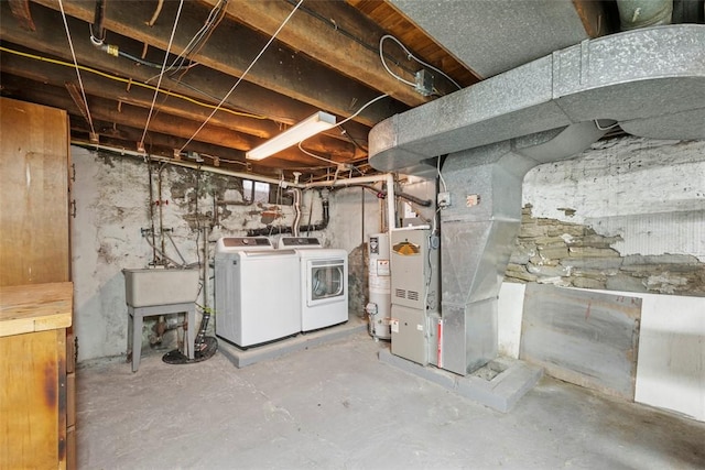 4829 Hatfield St, Lawrenceville, PA 15201 - unfinished below grade area with gas water heater, heating unit, and washer and clothes dryer