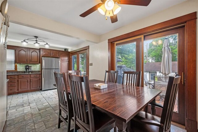 81 Dinsmore Ave, Crafton, PA 15205 - dining space with light stone finish floors, plenty of natural light, and a ceiling fan