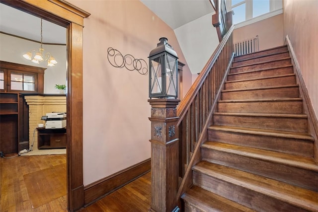 81 Dinsmore Ave, Crafton, PA 15205 - stairs featuring a chandelier and wood finished floors