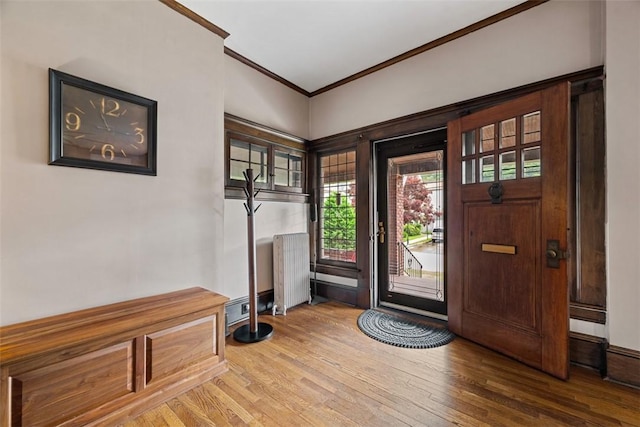 81 Dinsmore Ave, Crafton, PA 15205 - entrance foyer featuring radiator, ornamental molding, and wood finished floors