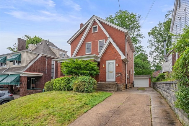 4035 Ludwick St, Squirrel Hill, PA 15217 - view of front of property featuring brick siding, a front yard, a chimney, an outdoor structure, and a garage
