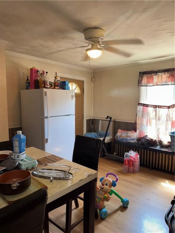 200 Jarvis St, Aliquippa, PA 15001 - dining room with wood finished floors, ceiling fan, and crown molding