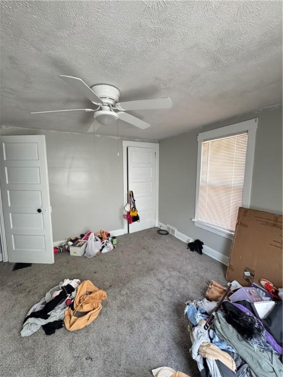 200 Jarvis St, Aliquippa, PA 15001 - rec room featuring a textured ceiling, carpet flooring, and ceiling fan