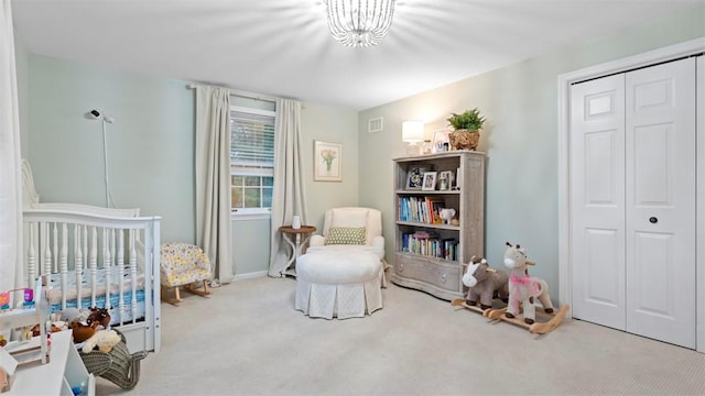 609 Twin Pine Rd, Fox Chapel, PA 15215 - carpeted bedroom with a closet, a chandelier, and a nursery area