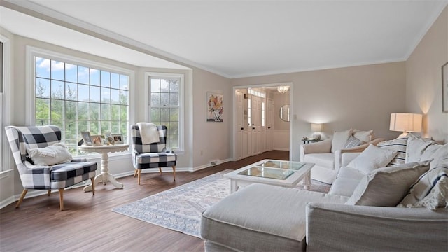 609 Twin Pine Rd, Fox Chapel, PA 15215 - living room with plenty of natural light, wood finished floors, and crown molding