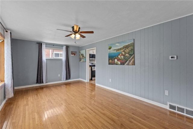 1028 Roseanne Ave, Banksville/Westwood, PA 15216 - unfurnished room featuring wood-type flooring and a ceiling fan