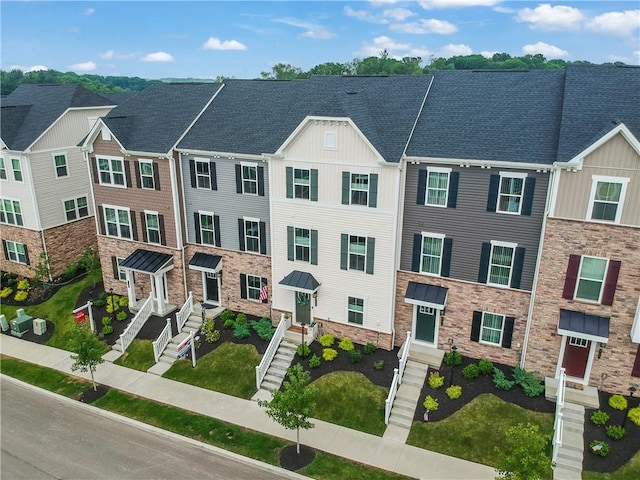 493 Nolan Cir, Cranberry Twp, PA 16066 - view of property featuring board and batten siding and stone siding