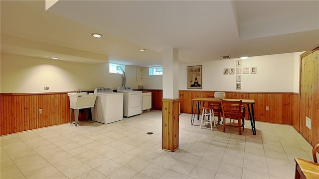 217 Monroe Dr, Ross Twp, PA 15229 - laundry area with a wainscoted wall, wood walls, independent washer and dryer, and recessed lighting