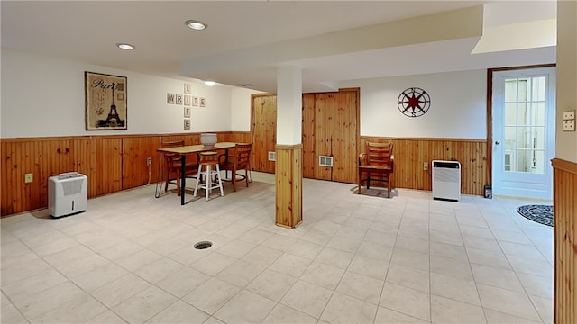 217 Monroe Dr, Ross Twp, PA 15229 - dining area featuring a wainscoted wall, wood walls, and recessed lighting
