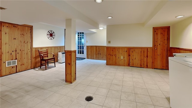 217 Monroe Dr, Ross Twp, PA 15229 - finished below grade area featuring a wainscoted wall, washer / clothes dryer, and wood walls