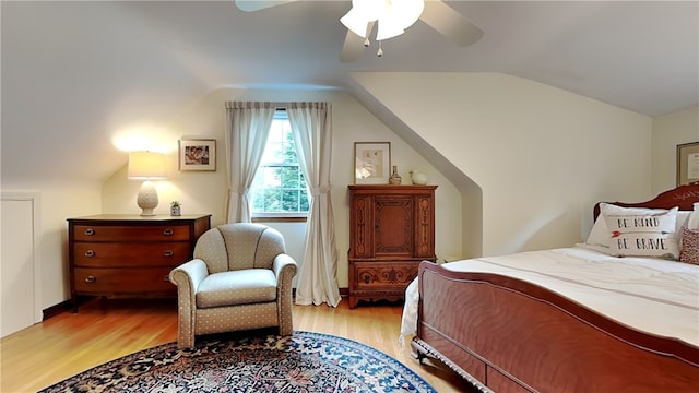 217 Monroe Dr, Ross Twp, PA 15229 - bedroom with light wood-style floors, vaulted ceiling, and ceiling fan