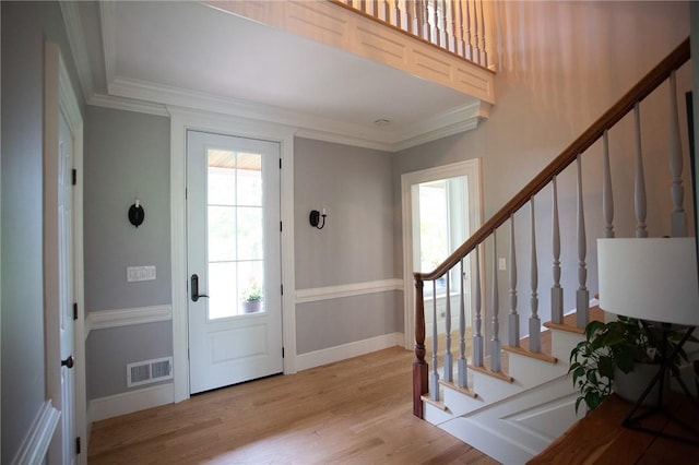 255 Camp Run Rd, Lancaster Twp, PA 16037 - foyer entrance with wood finished floors, crown molding, and stairway
