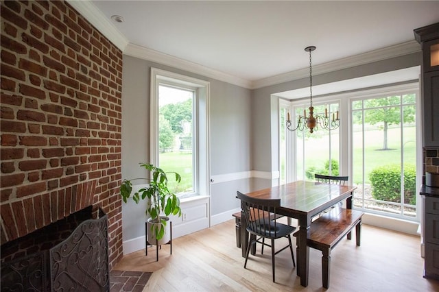 255 Camp Run Rd, Lancaster Twp, PA 16037 - dining area with plenty of natural light, a chandelier, light wood-type flooring, and ornamental molding