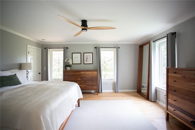 255 Camp Run Rd, Lancaster Twp, PA 16037 - bedroom featuring multiple windows, light wood-type flooring, ornamental molding, and a ceiling fan