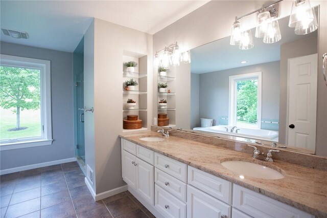 255 Camp Run Rd, Lancaster Twp, PA 16037 - full bath featuring a garden tub, built in features, double vanity, and tile patterned flooring