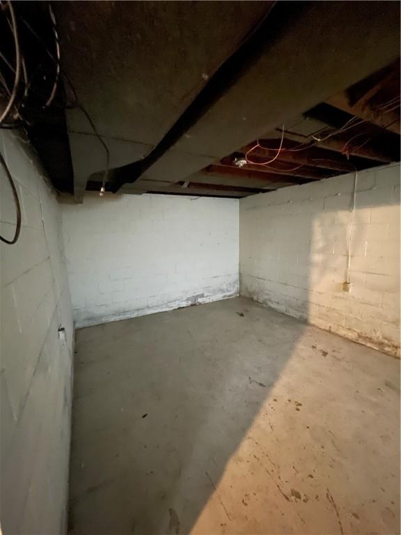 1114 Ingham St, Marshall Shadeland, PA 15212 - unfinished below grade area with concrete block wall