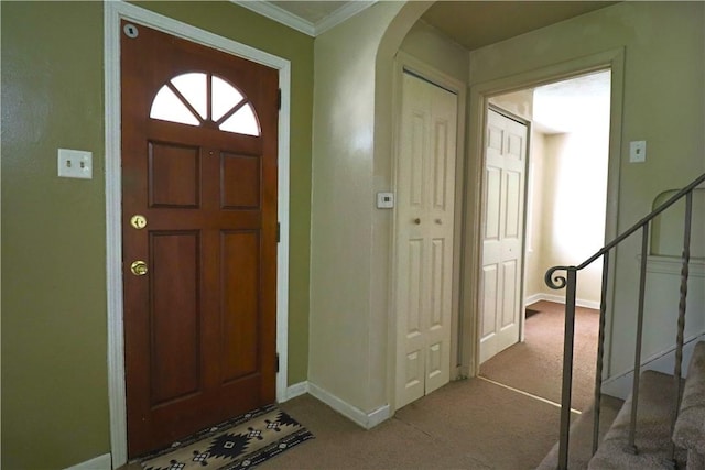 1818 Bluff St, West Mifflin, PA 15122 - carpeted entrance foyer with arched walkways, stairway, and crown molding