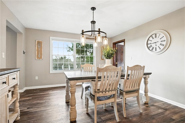 2310 Shamrock Ln, Canonsburg, PA 15317 - dining room with dark wood finished floors and a chandelier