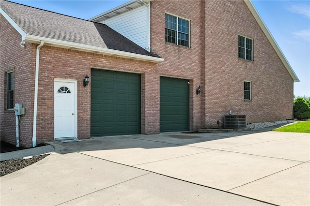 2310 Shamrock Ln, Canonsburg, PA 15317 - view of side of home featuring driveway, roof with shingles, and brick siding