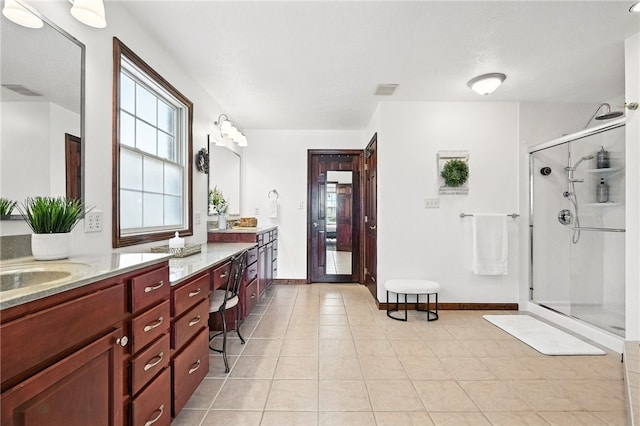 2310 Shamrock Ln, Canonsburg, PA 15317 - full bathroom featuring double vanity, a shower stall, and tile patterned flooring