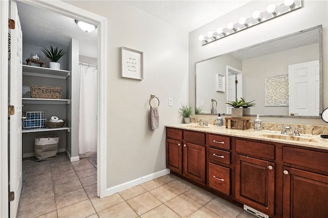 2310 Shamrock Ln, Canonsburg, PA 15317 - bathroom featuring double vanity and tile patterned flooring