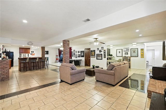 2310 Shamrock Ln, Canonsburg, PA 15317 - living area featuring decorative columns, light tile patterned floors, ceiling fan, bar area, and recessed lighting