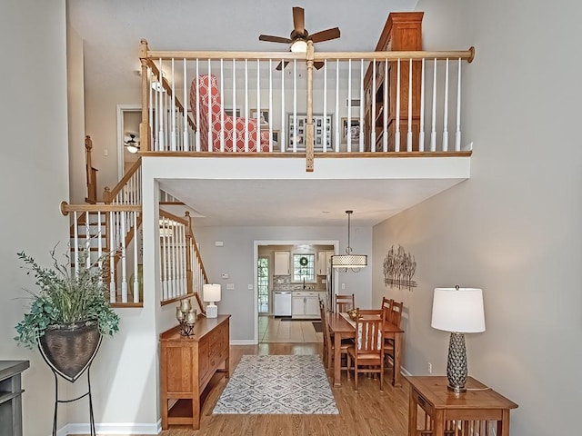 406 Country View Dr, Lower Burrell, PA 15068 - entryway with ceiling fan, stairs, and wood finished floors