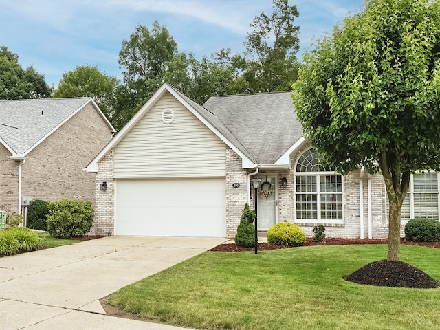 406 Country View Dr, Lower Burrell, PA 15068 - view of front of property featuring concrete driveway, brick siding, a front lawn, an attached garage, and roof with shingles