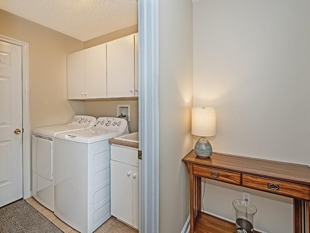 406 Country View Dr, Lower Burrell, PA 15068 - washroom featuring cabinet space, washer and dryer, and a textured ceiling