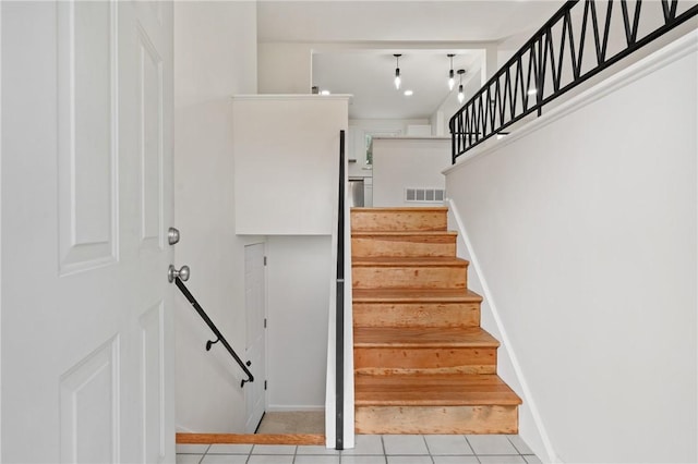 213 Thistle Dr, West Mifflin, PA 15122 - staircase with tile patterned flooring and baseboards