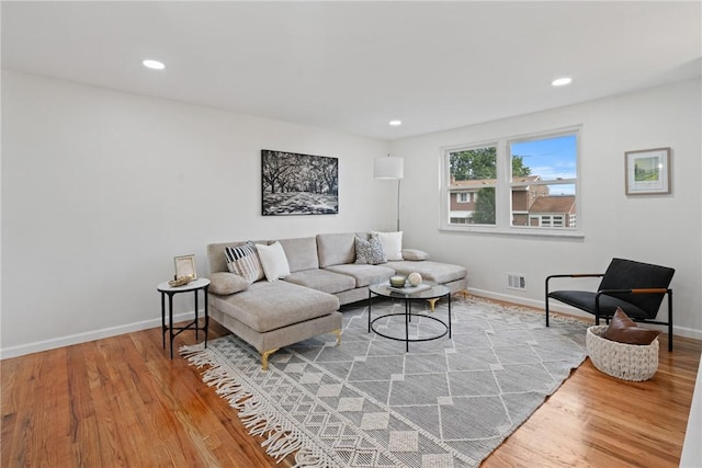 213 Thistle Dr, West Mifflin, PA 15122 - living room featuring wood finished floors and recessed lighting
