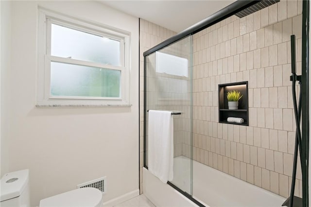 213 Thistle Dr, West Mifflin, PA 15122 - bathroom with toilet and combined bath / shower with glass door