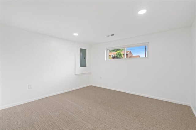 213 Thistle Dr, West Mifflin, PA 15122 - carpeted spare room featuring electric panel and recessed lighting
