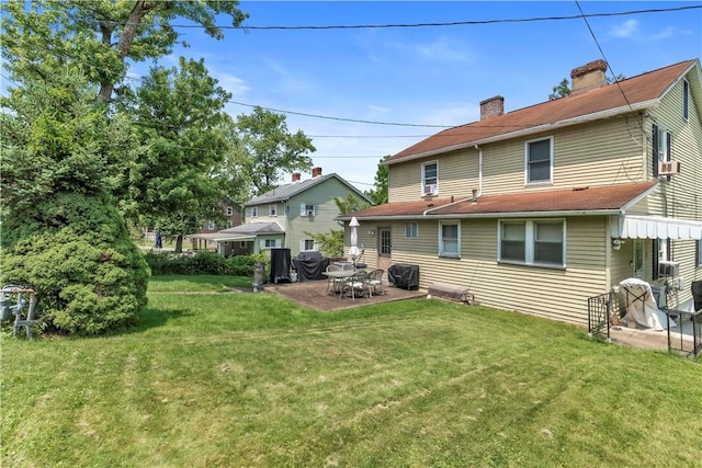 18 Allegheny Ave, South Fayette, PA 15031 - back of house with a patio, a yard, and a chimney