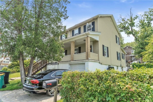 18 Allegheny Ave, South Fayette, PA 15031 - view of front of house featuring an attached garage and stairway