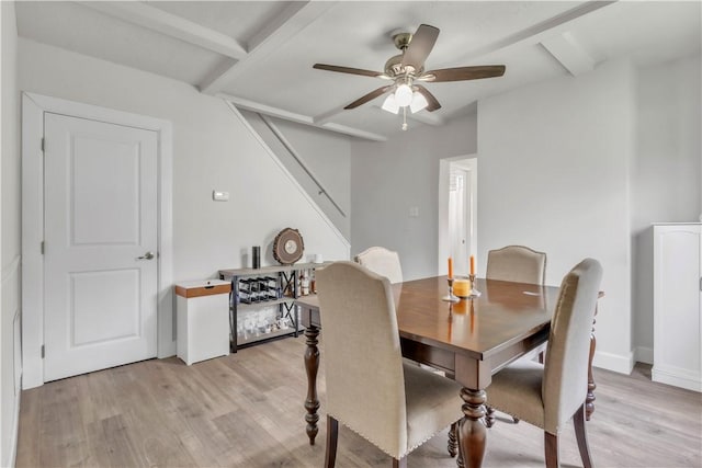 18 Allegheny Ave, South Fayette, PA 15031 - dining space with light wood-style floors, ceiling fan, beam ceiling, and stairway