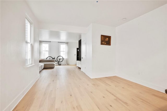 2013 Straubs Ln, Troy Hill, PA 15212 - unfurnished living room featuring light wood-style floors and baseboards