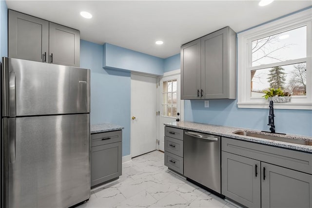 2301 Fairland St, Overbrook, PA 15210 - kitchen featuring stainless steel appliances, gray cabinets, light marble finish floors, recessed lighting, and light stone counters