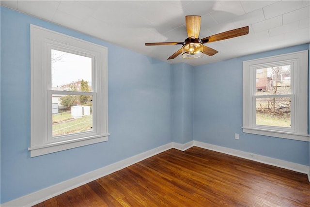 2301 Fairland St, Overbrook, PA 15210 - unfurnished room featuring plenty of natural light, dark wood-style flooring, and ceiling fan