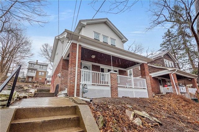 2301 Fairland St, Overbrook, PA 15210 - view of front of property with a porch and brick siding