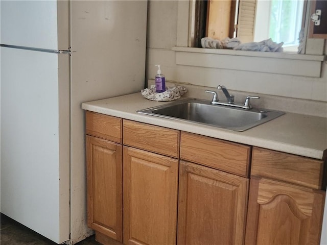 1340 Silver Ln, Robinson Twp Nwa, PA 15108 - kitchen featuring light countertops, freestanding refrigerator, and brown cabinets
